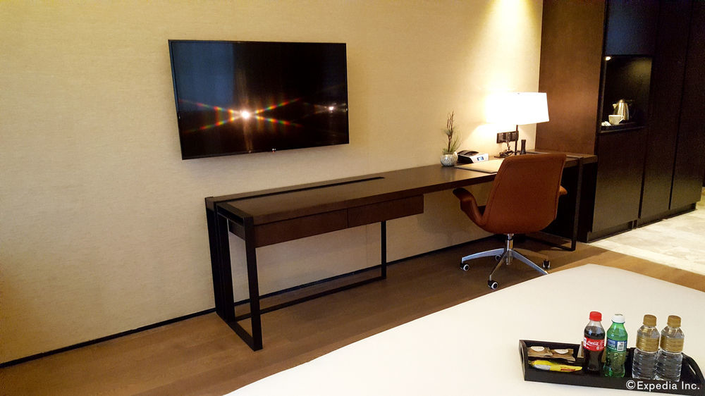 I'M Hotel Макати Экстерьер фото A television mounted on a wall